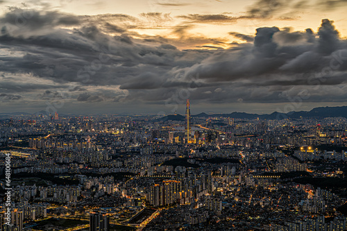 Night view of Seoul in the city center overlooking Lotte World and Seoul Tower clearly. View from Namhansanseong Mountain, Seoul, South Korea.