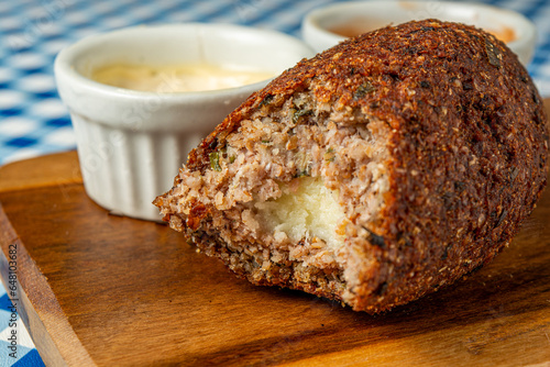 kibe, traditional Brazilian fried food. typical fried snack food stuffed with cheese photo