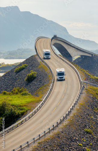 Caravan car RV travels on the highway Atlantic Ocean Road Norway.