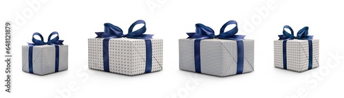 Obraz na płótnie Side view of Christmas, birthday or valentine presents decorated in pale blue spots and stripes with a blue ribbon bow isolated against a transparent background. w salonie