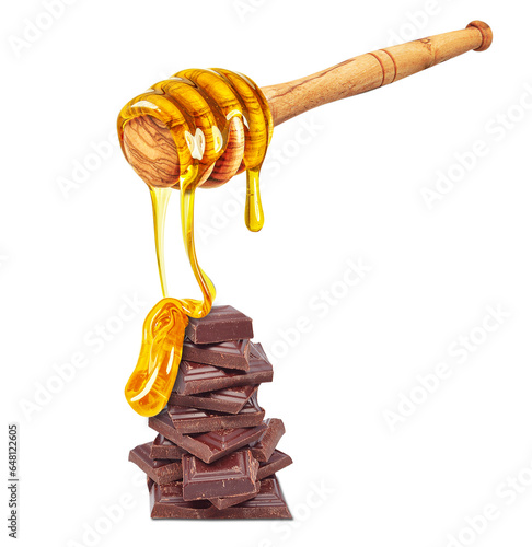 dripping honey on chocolate pieces isolated on white background © slawek_zelasko