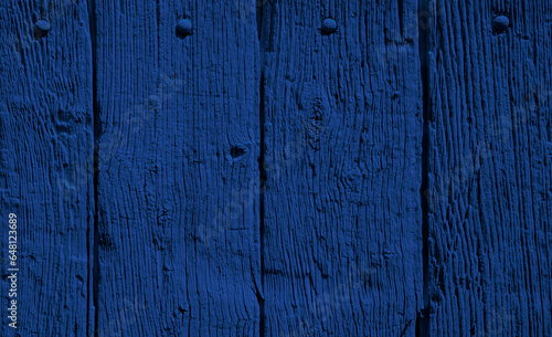 Blauer Holzhintergrund mit weihnachtlicher Dekoration