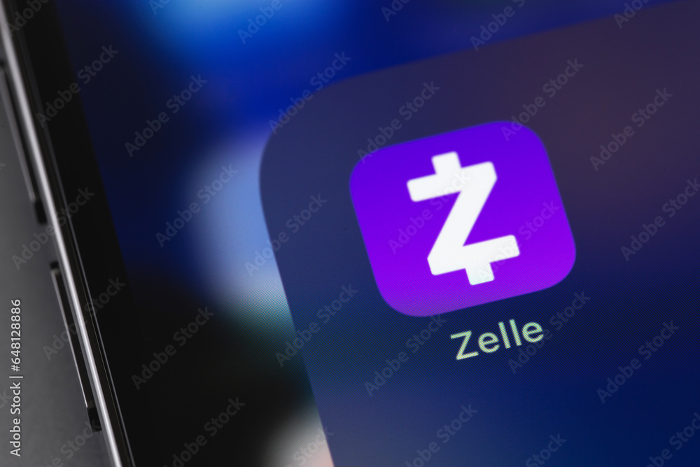 Zelle mobile app on a screen smartphone iPhone closeup. Zelle is a US