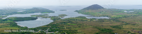 Diamond hill surroundings, view on a beautiful landscape. Diamond hill in Connemara National park, county Galway, Ireland, Bright sunny day, blue cloudy sky.