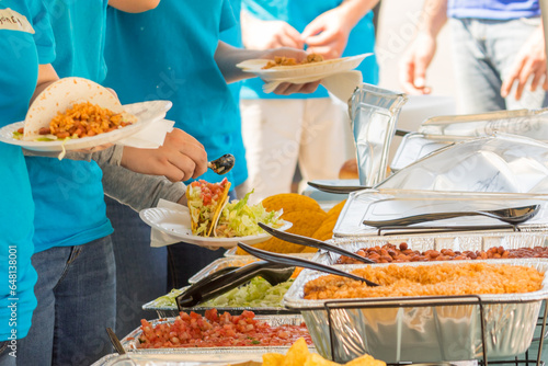 Getting Fresh: Preparing a Delicious Taco in a Tortilla on Taco Bar 