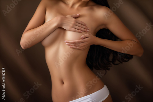 portrait of a woman self exam breast photo