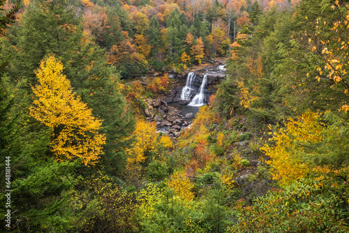 Blackwater Falls in Blackwater Falls State Park, West Virginia, surrounded by fall foliage.