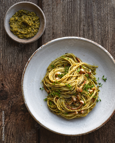 spaghetti with pesto sauce and oyster mushrooms