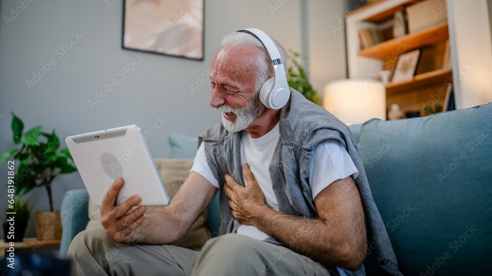 One senior man use digital tablet to watch movie or have a video call One senior man use digital tablet to watch movie or have a video call