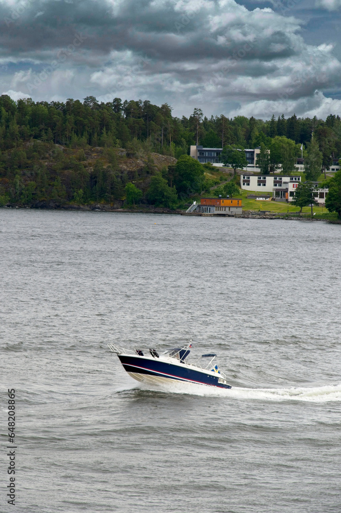 Fototapeta premium Swedish speed boat in Stockholm Archipelago on the Baltic Sea - Sweden