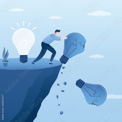 Learning from failures, striving for best. Creative businessman throws broken light bulbs off cliff. ambitious entrepreneur came up with an innovative idea. Brainstorming, pitching ideas