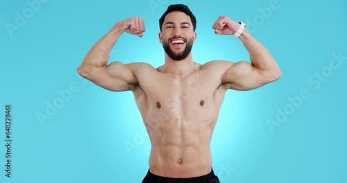 Happy man flex muscle, body and fitness in studio isolated on blue background mockup space. Face portrait, abs and strong arms of athlete, bodybuilder and workout biceps, training or exercise health