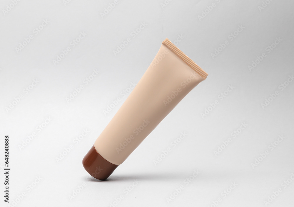 Foundation tube levitates on a gray background Foundation tube levitates on a gray background