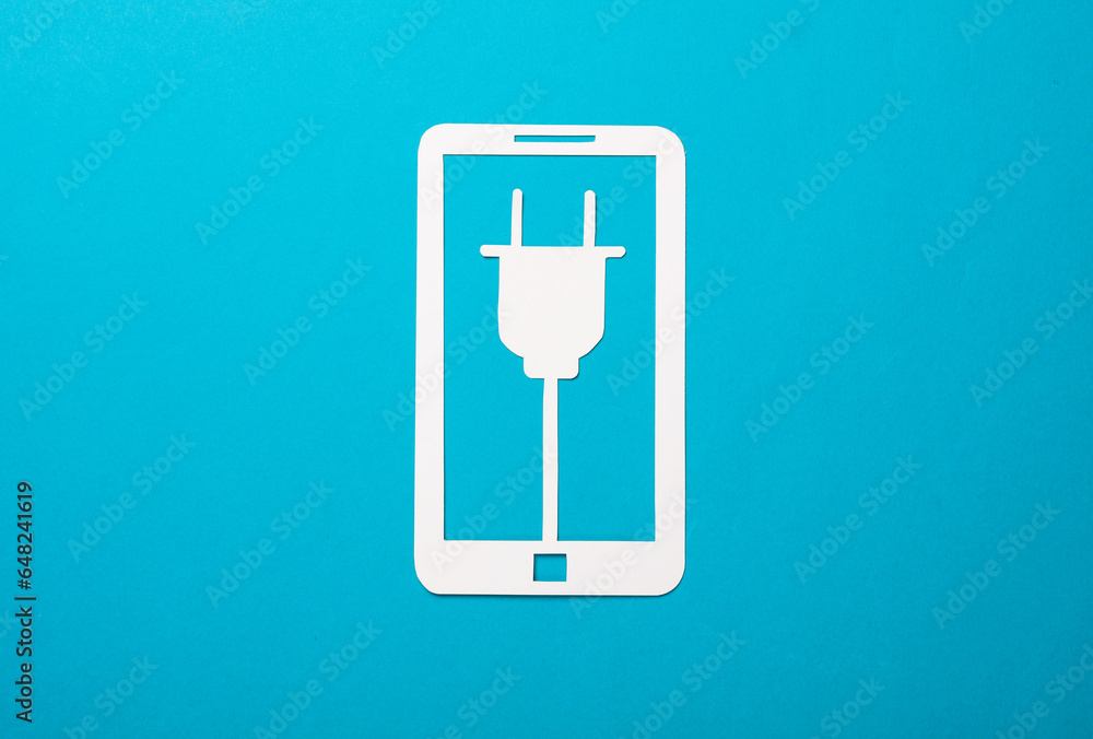 Paper-cut smartphone icon with electric plug on blue background Paper-cut smartphone icon with electric plug on blue background