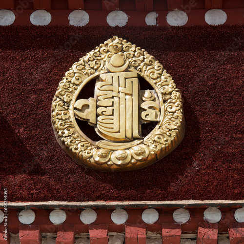 A gold symbol at the sera monastery; Lhana xizang china photo