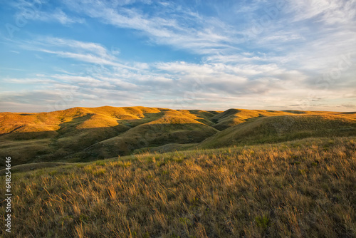 The setting sun lights up the top of the coulees in grasslands national park; Saskatchewan canada photo