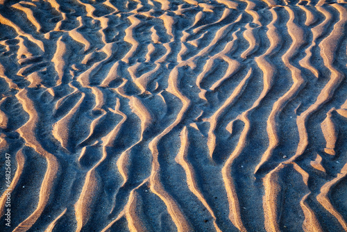 Ripples in the sand at derrynane beach; County kerry, ireland photo