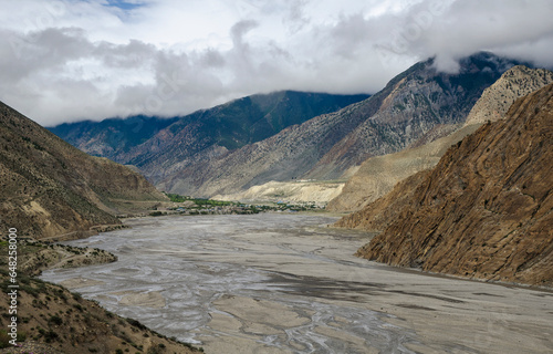 Wide angle view of kali gandaki riverbed and jomsom town; Mustang nepal photo