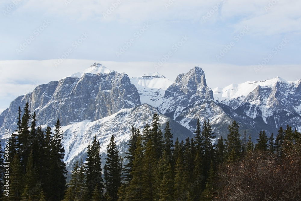 View Of The Rocky Mountains Above The Village Of Canmore; Canmore, Alberta, Canada View Of The Rocky Mountains Above The Village Of Canmore; Canmore, Alberta, Canada