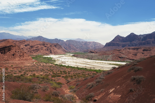 Mountainous Landscape With Red Soil And Rock In A Valley; Valle De Lerma, Salta Province, Argentina photo