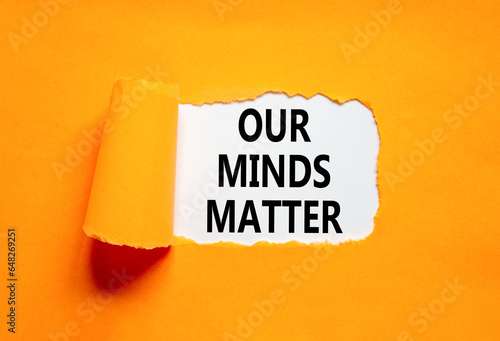 Our minds matter ourmindsmatter symbol. Concept words Our minds matter on beautiful white paper. Beautiful orange background. Our minds matter ourmindsmatter concept. Copy space.