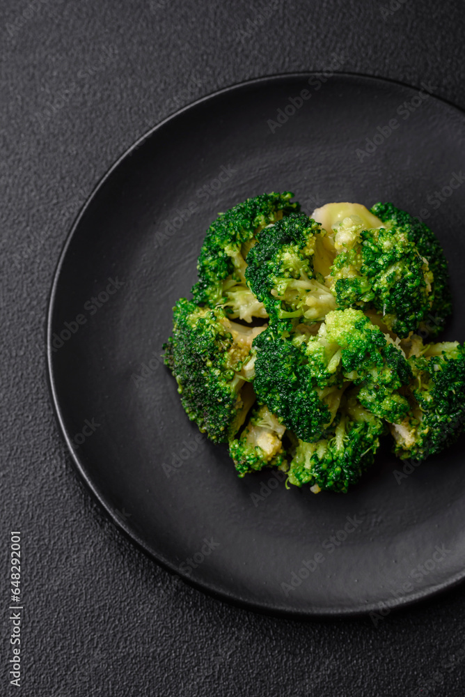 Delicious fresh green broccoli steamed in a ceramic plate Delicious fresh green broccoli steamed in a ceramic plate