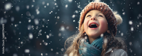 Magic of a child s wonder as they catch snowflakes on their tongue during the first snowfall of the season