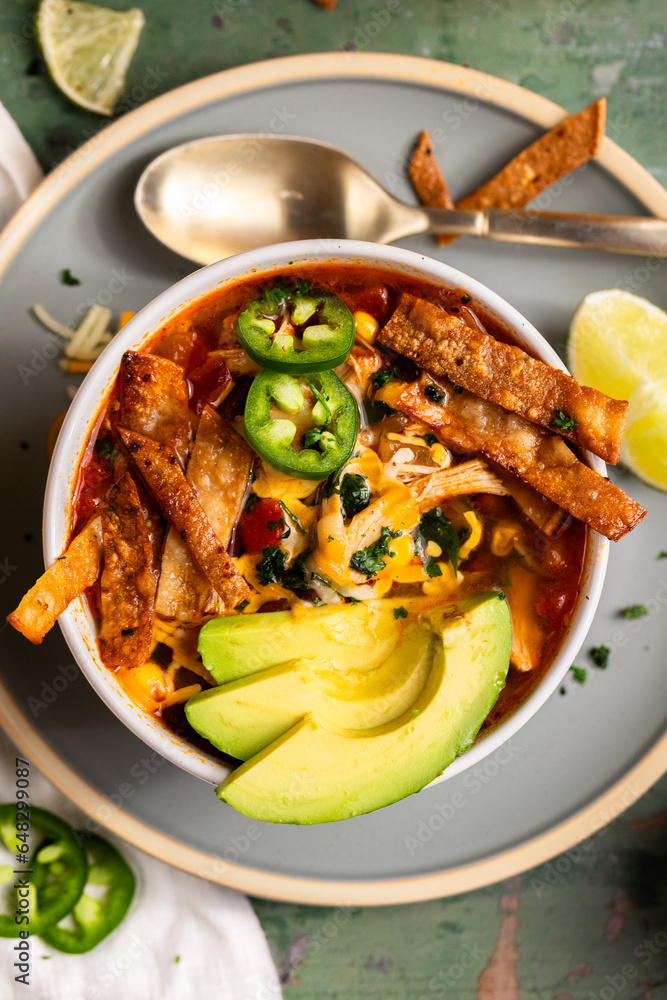 Tortilla Soup with Avocado, Jalapeños, Tortilla Strips and Lime Tortilla Soup with Avocado, Jalapeños, Tortilla Strips and Lime