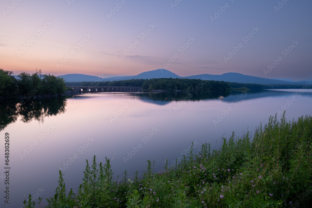 Amazing peaceful sunset at Catskill, New York feutering Ashokan Reservoir. It is the city's deepest reservoir at 190 feet at the dam