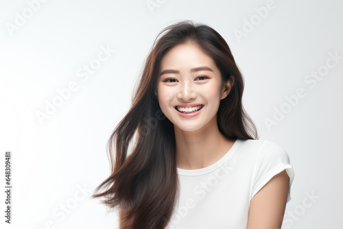 A closeup photo portrait of a beautiful young asian model woman laughing and smiling with clean teeth. used for a dental ad. isolated on white background
