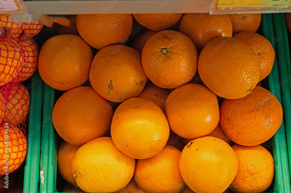 A crate of oranges at the market..