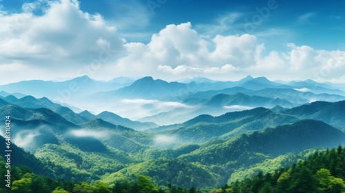 Nature background - a majestic mountain range with clouds in the sky © mattegg