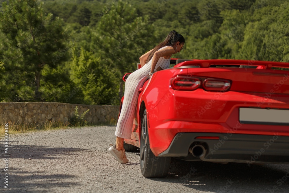 Road trip travel vacation concept, woman with car at summer