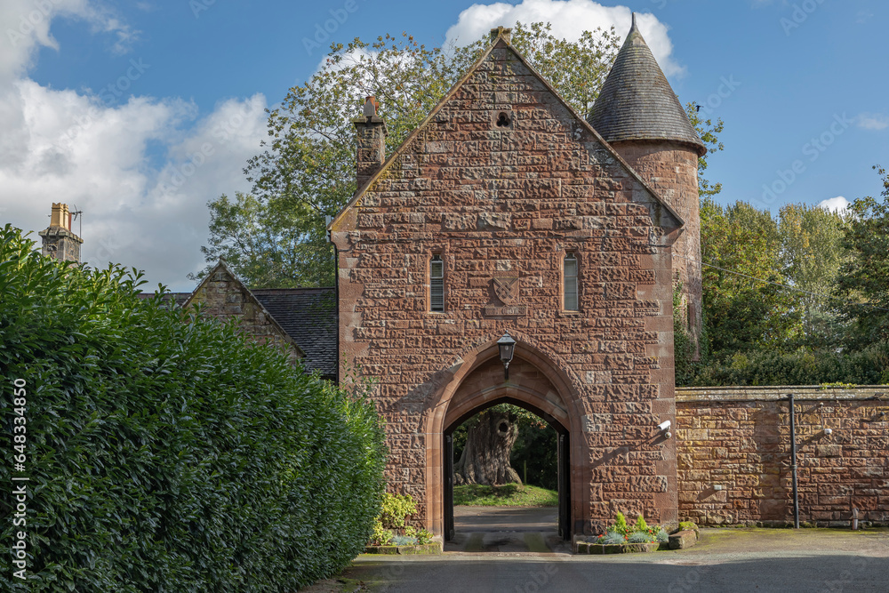 Arched castle entrance with open gates Arched castle entrance with open gates