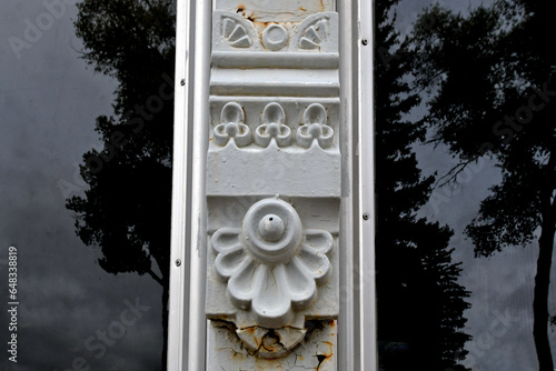 Art Deco embellishment between windows on old building, Kemmerer, Wyoming photo