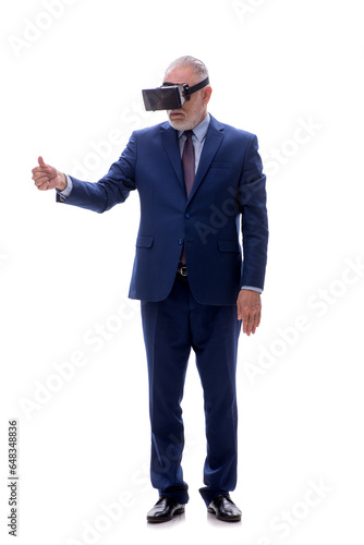 Old businessman wearing virtual glasses isolated on white