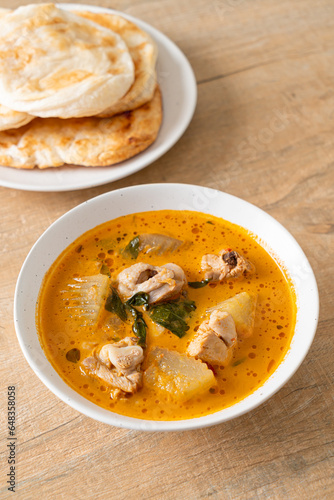 Chicken curry soup with roti
