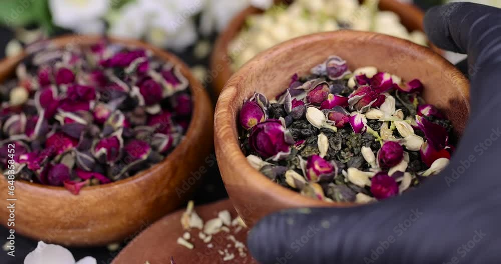 green tea mixed with dried rose and jasmine flowers, tea preparation with the addition of tea rose and jasmine flowers for taste and aroma green tea mixed with dried rose and jasmine flowers, tea preparation with the addition of tea rose and jasmine flowers for taste and aroma