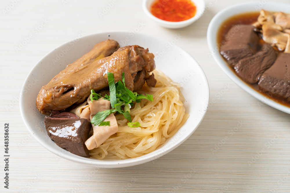 dried noodles with braised duck in white bowl dried noodles with braised duck in white bowl