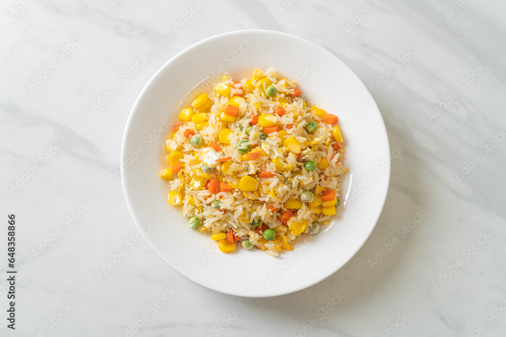 fried rice with mixed vegetable (carrot, green bean peas, corn) and egg fried rice with mixed vegetable (carrot, green bean peas, corn) and egg