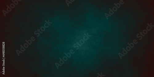 Abstract decorative dark green dark stucco wall background. art texture banner with space for text. blank background.