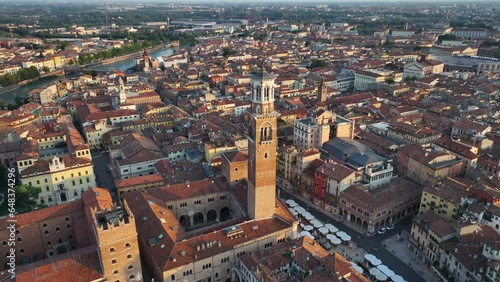 Verona urban skyline, Establishing Aerial View Shot of Piazza delle Erbe, Torre dei Lamberti, historical city centre, urban skyline, Cathedral, Veneto Region, Italy