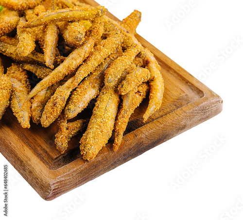 Crispy breaded european smelt fish on wooden