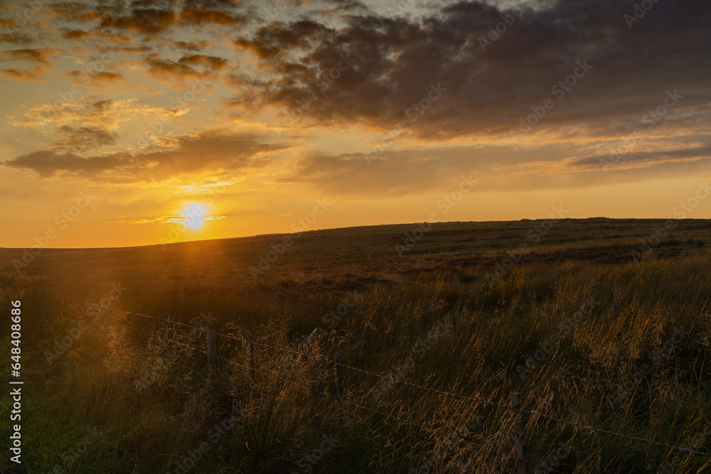 sunset over moorland in Northumberland, UK