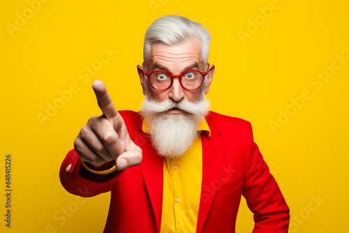 Colorful studio portrait of an old man using modern day technology and gadgets. Bold, vibrant and minimalist. Generative AI