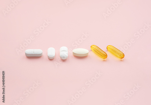 Daily vitamin dosage. Some various pills layout.