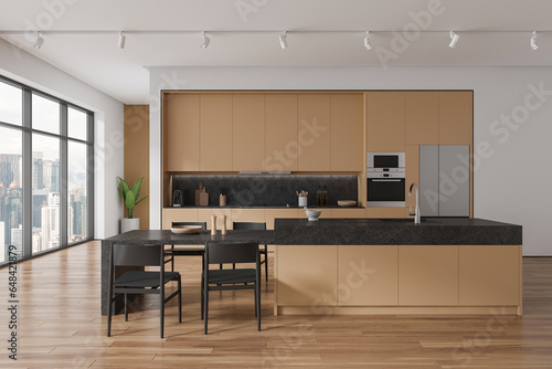 Beige home kitchen interior with bar counter and chairs, cabinet with window