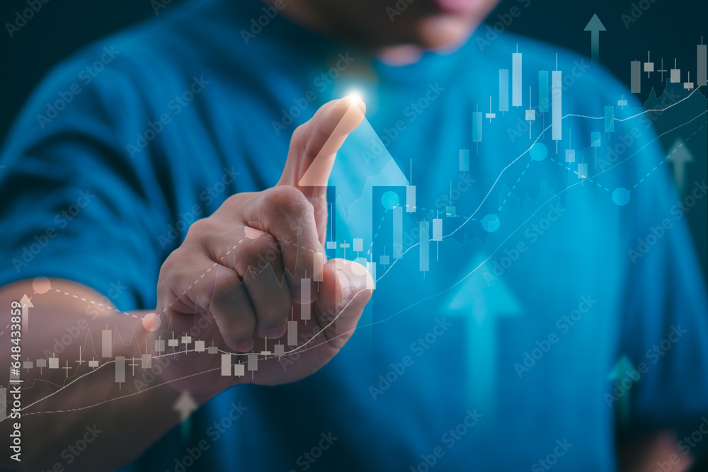 Planning and strategy, stock market, business growth, progress or success concept, businessman or trader showing growing virtual holographic stocks, invest in stock market trading or digital assets Planning and strategy, stock market, business growth, progress or success concept, businessman or trader showing growing virtual holographic stocks, invest in stock market trading or digital assets
