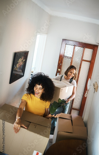 Boxes, homeowner and couple with love, lesbian or moving with real estate, achievement or excited. Queer people, happy women or girls with marriage, goals or new apartment with happiness or property