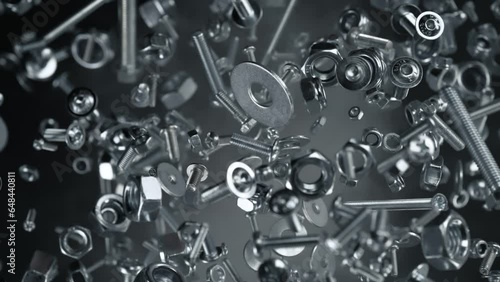 Super Slow Motion Shot of Fasteners Flying Towards Camera Isolated on Black at 1000fps. photo